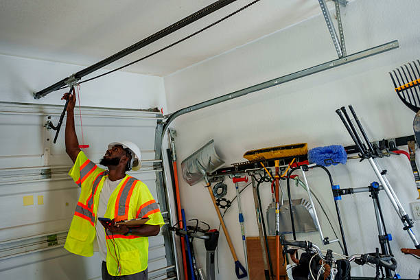 Professional Garage Door Panel Replacement technician working in Shorewood Forest, IN